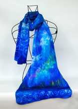 Load image into Gallery viewer, silk_satin_scarf_in_shades_of_bright_blue_with_hints_of_yellow_pink_and-aqua
